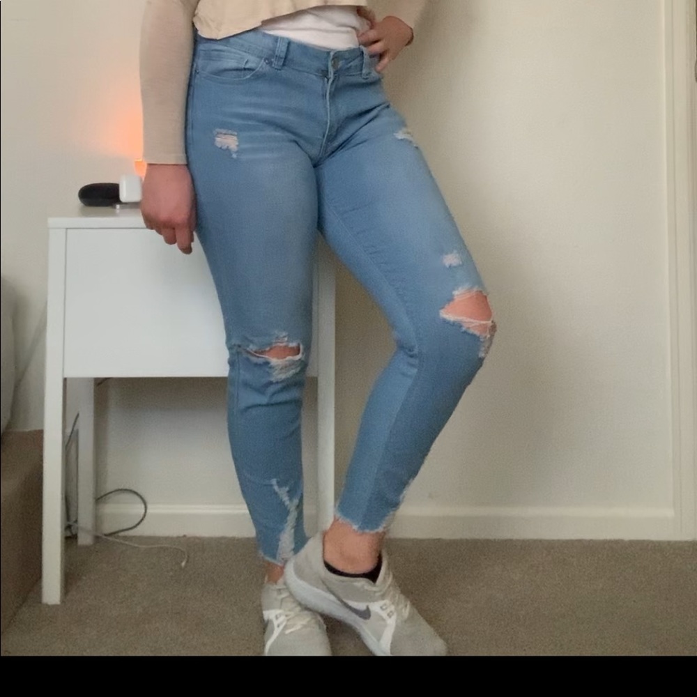 Light blue ripped jeans